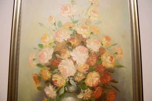 A signed & framed original oil painting of flowers by American artist "C Tommy"