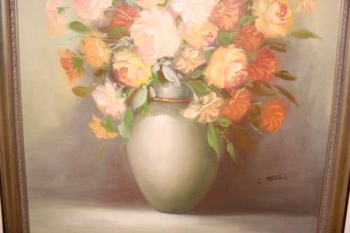 A signed & framed original oil painting of flowers by American artist "C Tommy"
