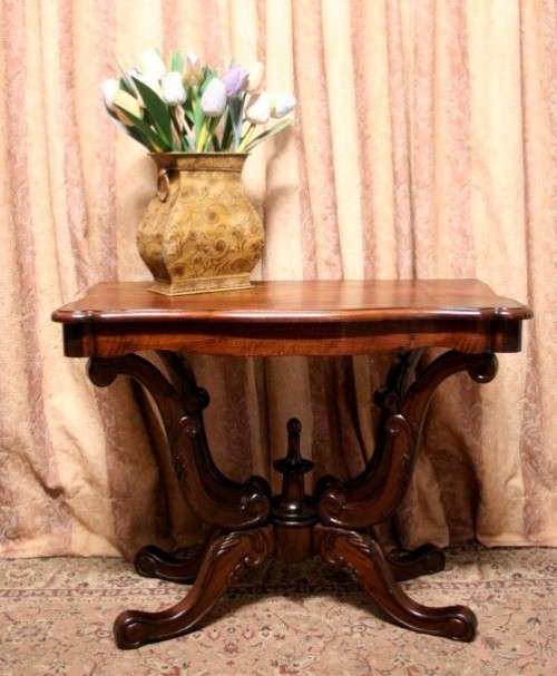 A fabulous vintage Teak hallway/display table with ornate carved finial & detailing at the bottom