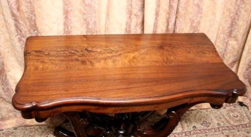 A fabulous vintage Teak hallway/display table with ornate carved finial & detailing at the bottom