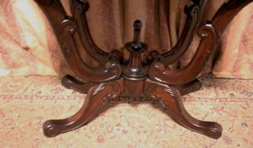A fabulous vintage Teak hallway/display table with ornate carved finial & detailing at the bottom