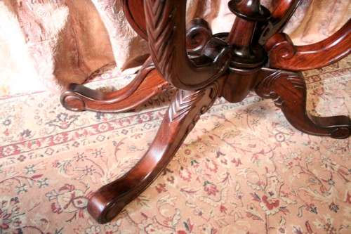 A fabulous vintage Teak hallway/display table with ornate carved finial & detailing at the bottom