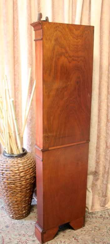 A sturdy well made 2-division Mahogany corner display unit cabinet with ample shelves and space