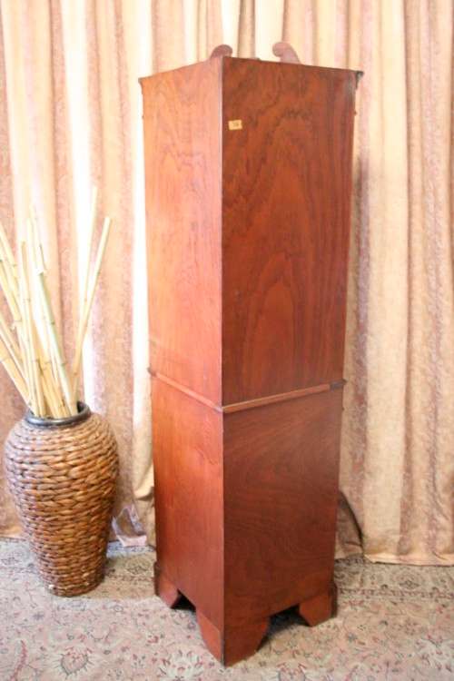 A sturdy well made 2-division Mahogany corner display unit cabinet with ample shelves and space