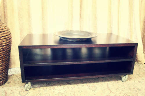 A stunning stylish wooden TV stand on wheels with place for your entertainment centre