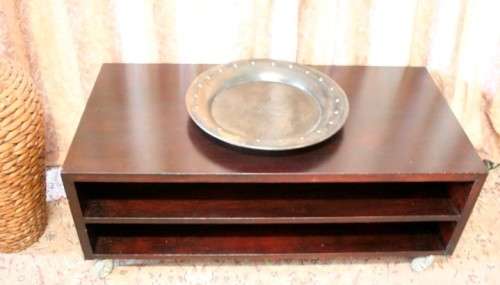 A stunning stylish wooden TV stand on wheels with place for your entertainment centre