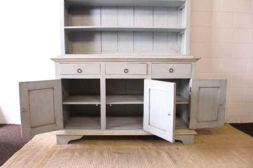 A gorgeous three drawer, three cupboard kitchen buffet side server in a pale blue painted technique