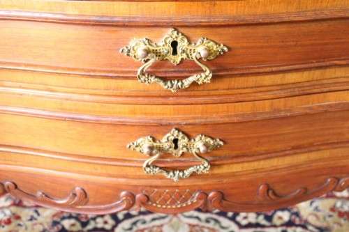 A beautiful antique French Mahogany cabinet with curved glass doors and a bevelled glass mirror