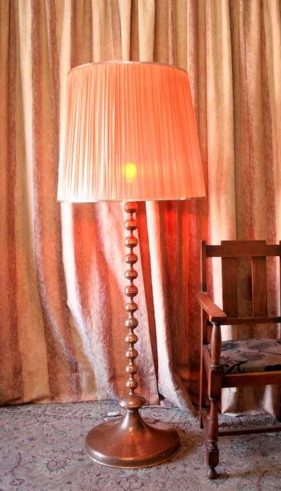 A gorgeous vintage retro styled floor standing copper base lamp with a stunning x large shade.