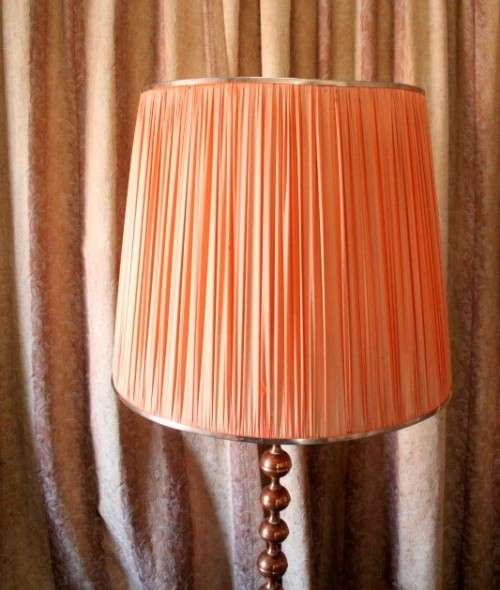 A gorgeous vintage retro styled floor standing copper base lamp with a stunning x large shade.