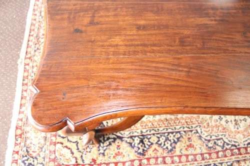 A vintage stink-wood scalloped edge ball and claw cross-brace 6-8-seater D/Table. Lifespace Sale