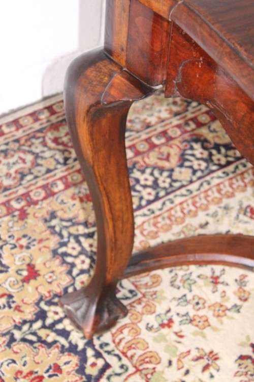 A vintage stink-wood scalloped edge ball and claw cross-brace 6-8-seater D/Table. Lifespace Sale