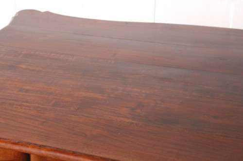 A vintage stink-wood scalloped edge ball and claw cross-brace 6-8-seater D/Table. Lifespace Sale