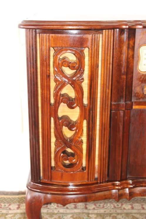 An awesome and solidly made vintage solid Imbuia ball and claw Radiogram cabinet