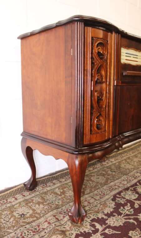 An awesome and solidly made vintage solid Imbuia ball and claw Radiogram cabinet