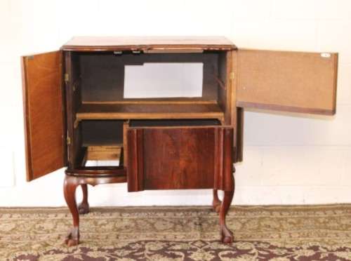 An awesome and solidly made vintage solid Imbuia ball and claw Radiogram cabinet