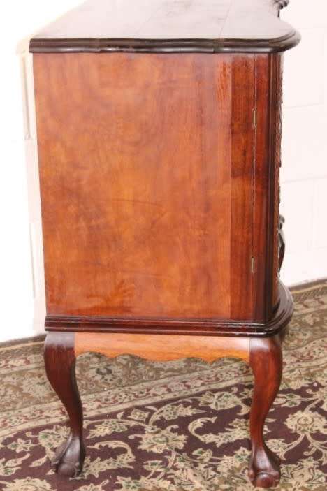 An awesome and solidly made vintage solid Imbuia ball and claw Radiogram cabinet