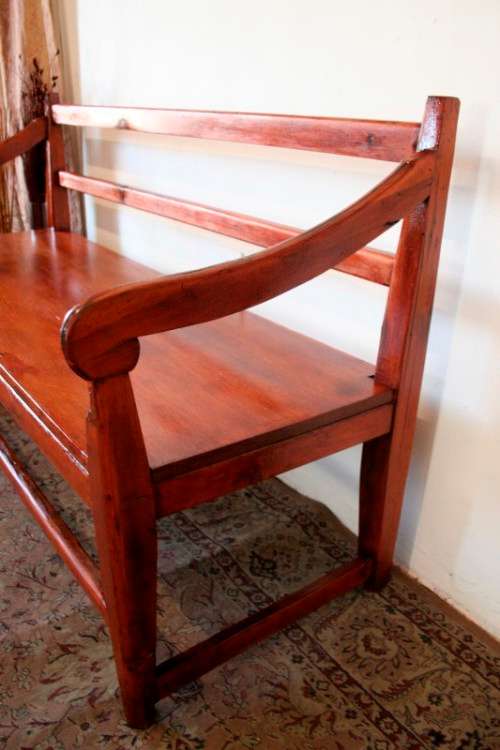 A wonderful well-made, sturdy vintage three seater  wood bench - perfect  in a lapa/ patio!