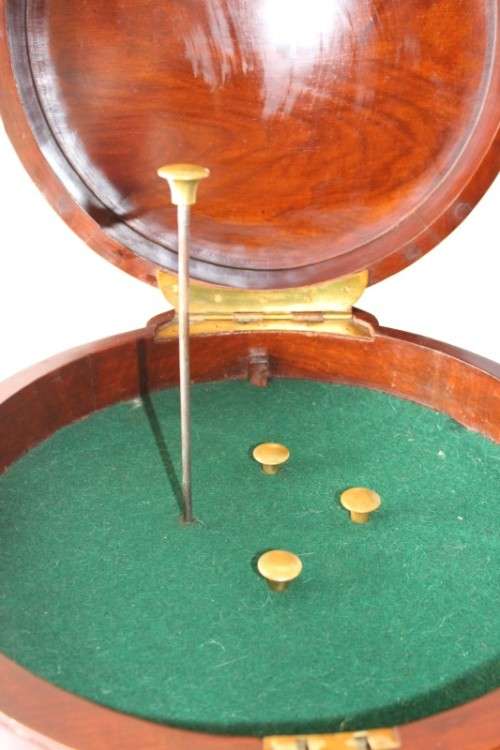 A spectacular and beautifully made solid rosewood round 12-drawer jewellery chest with brass inlay