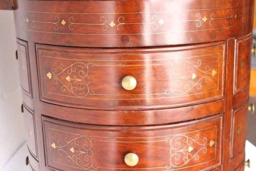 A spectacular and beautifully made solid rosewood round 12-drawer jewellery chest with brass inlay