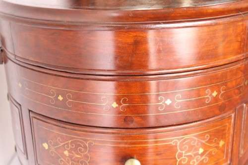 A spectacular and beautifully made solid rosewood round 12-drawer jewellery chest with brass inlay
