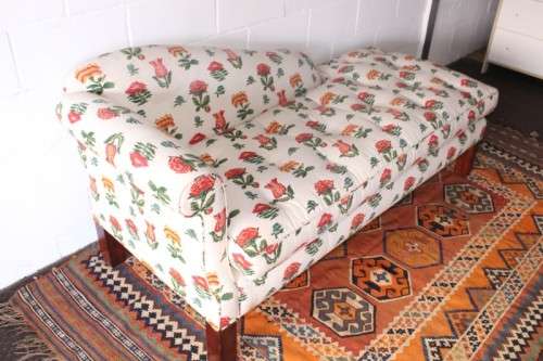 beautifully upholstered modern styled chaise lounge in a red and white floral fabric-Lifespace Sale