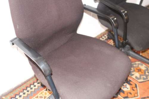 **RS17** 2x mobile high-back office/ desk chairs; one is black the other is brown - one bid for both