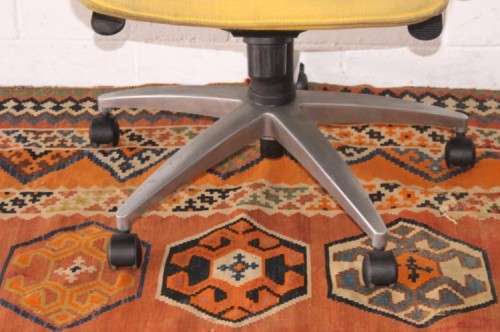 **RS17** A modern styled yellow and white office chair with tilt, height and tension adjusters