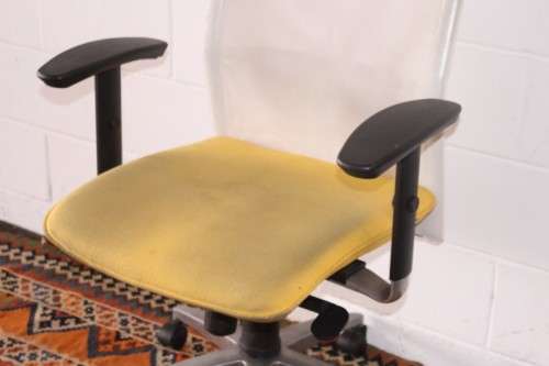 **RS17** A modern styled yellow and white office chair with tilt, height and tension adjusters