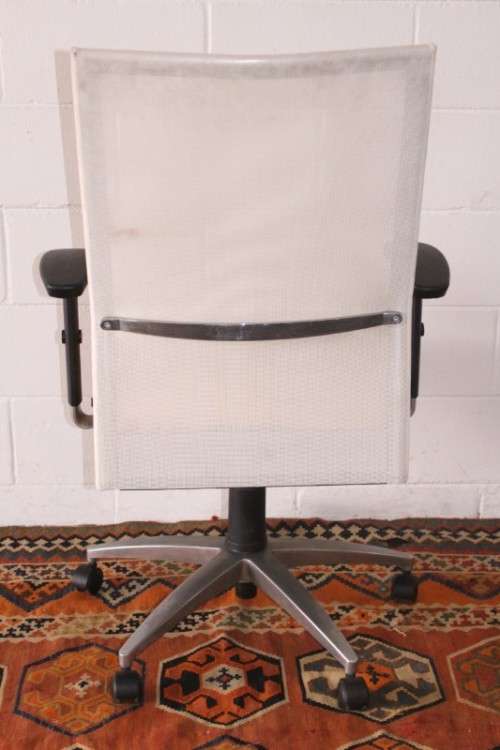 **RS17** A modern styled yellow and white office chair with tilt, height and tension adjusters