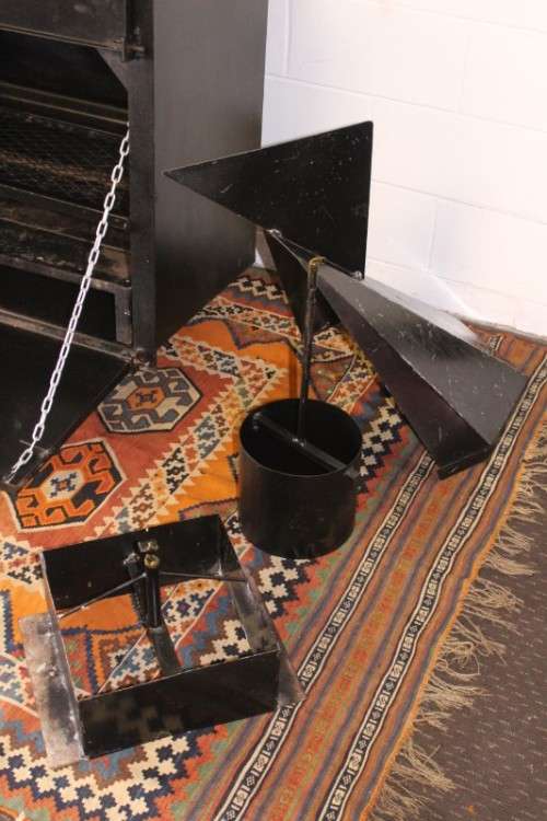 An awesome (1.2m) steel double-door built in braai w/ potjie hook, ash trays, rotating cowel & more