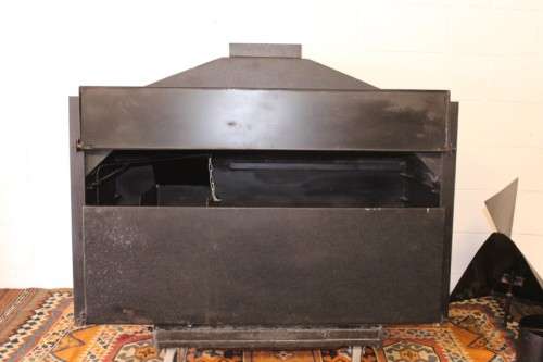 An awesome (1.2m) steel double-door built in braai w/ potjie hook, ash trays, rotating cowel & more