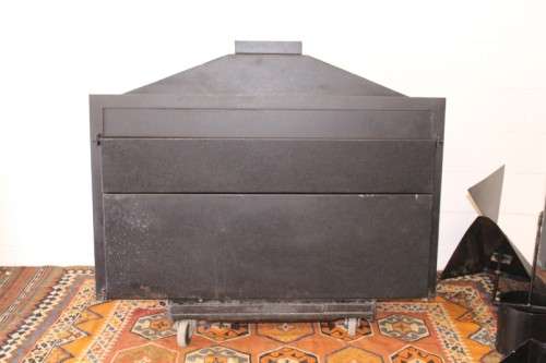 An awesome (1.2m) steel double-door built in braai w/ potjie hook, ash trays, rotating cowel & more