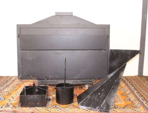An awesome (1.2m) steel double-door built in braai w/ potjie hook, ash trays, rotating cowel & more