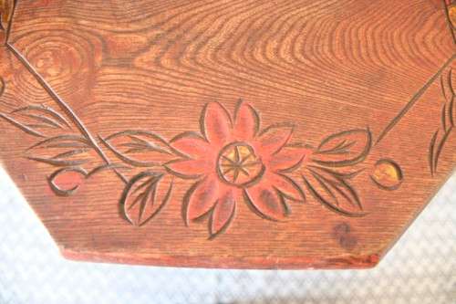 A gorgeous carved round occasional/ side table w/ painted detail on the top and bottom shelf base.