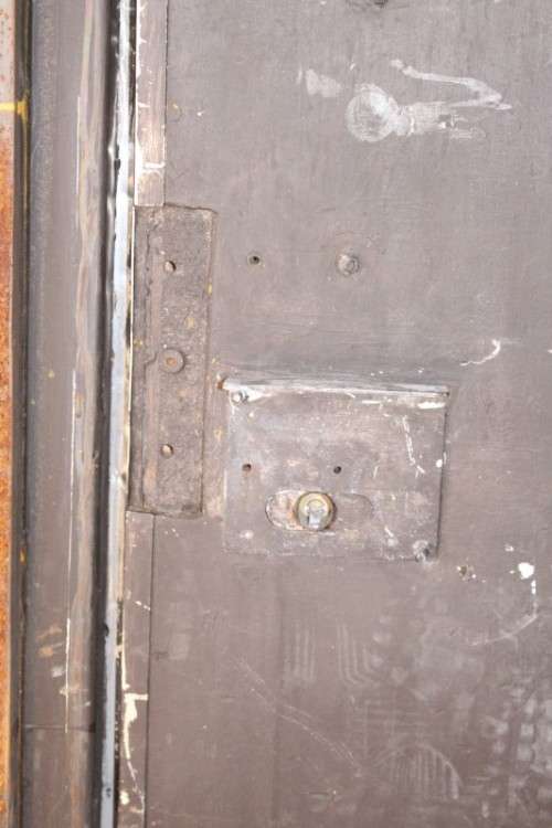 A large steel strongroom/ vault security door w/ a window -Lifespace Sale