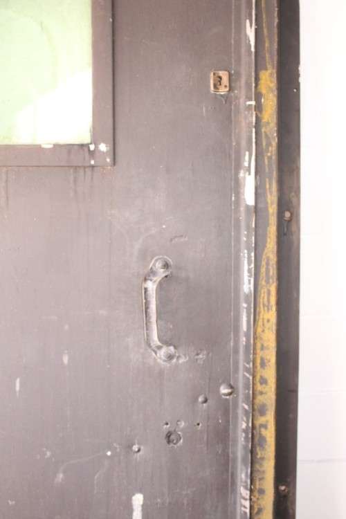 A large steel strongroom/ vault security door w/ a window -Lifespace Sale