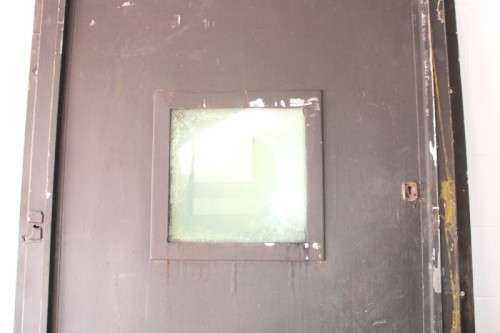 A large steel strongroom/ vault security door w/ a window -Lifespace Sale