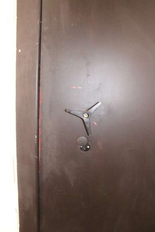 A heavy solidly made steel strongroom/ vault security door - Lifespace Sale