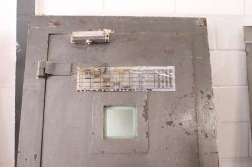 A large steel strongroom/ vault security door w/ a window - perfect for office or home installation