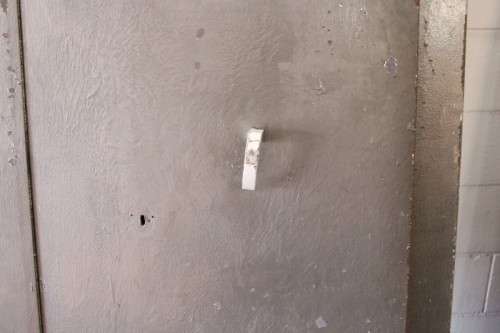 A large steel strongroom/ vault security door w/ a window - perfect for office or home installation