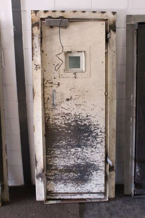 A large steel strongroom/ vault security door w/ a window - perfect for office or home installation