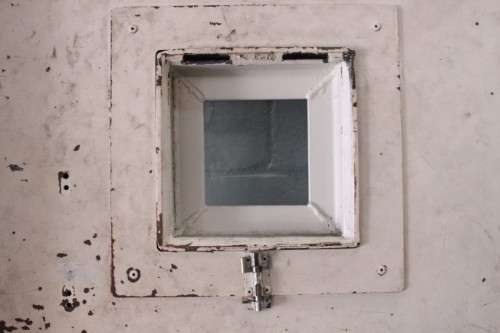 A large steel strongroom/ vault security door w/ a window - perfect for office or home installation