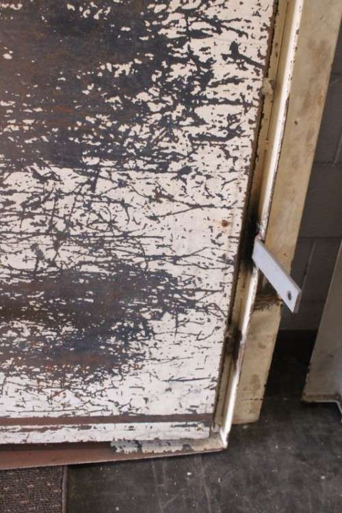 A large steel strongroom/ vault security door w/ a window - perfect for office or home installation