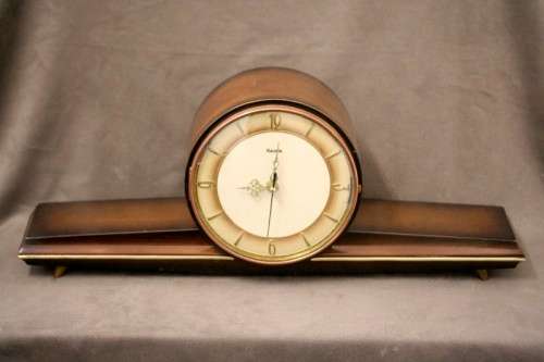 A gorgeous German made Art deco style "Hermle" battery operated gong chiming mantle clock