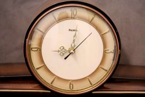 A gorgeous German made Art deco style "Hermle" battery operated gong chiming mantle clock