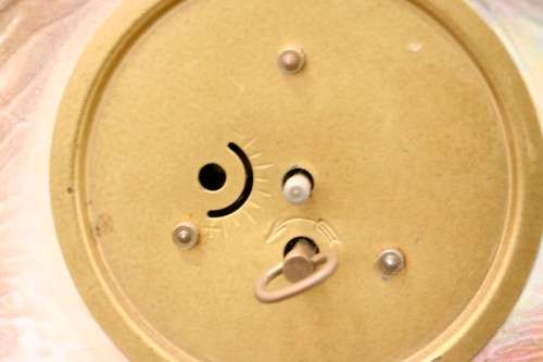 A gorgeous, decorative German made porcelain Jaguar wind up clock.