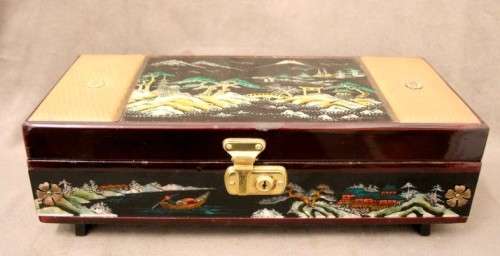 A gorgeous vintage Chinese jewellery box with a mirror, lock and key. Lovely on a dresser.
