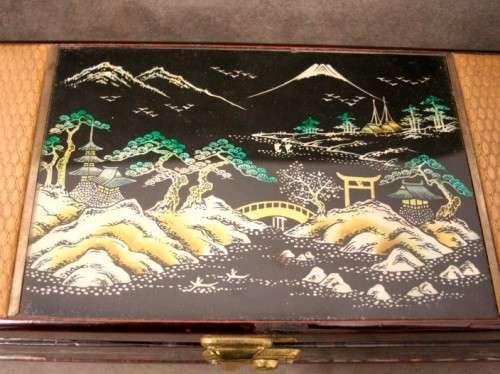 A gorgeous vintage Chinese jewellery box with a mirror, lock and key. Lovely on a dresser.