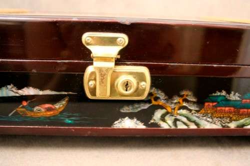 A gorgeous vintage Chinese jewellery box with a mirror, lock and key. Lovely on a dresser.